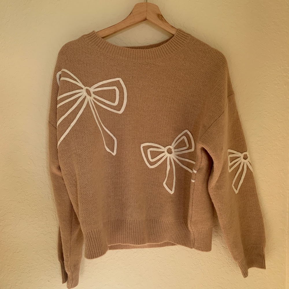 Tan Sweater with White Bow Accents